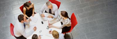 people sitting at a roundtable